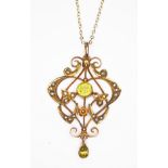 An Edwardian Art Nouveau style garnet topped double and seed pearl pendant, length 44mm, on 45cm
