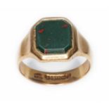 A 9ct gold signet ring set with a bloodstone slab, hallmarked 9ct gold, sponsor 'J.H.W',