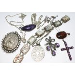 A mixed lot of silver and white metal jewellery comiprising two white metal locket pendants on