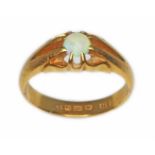 A 1920s 22ct gold opal signet ring, sponsor 'SH', Birmingham 1929, gross wt. 6.1g, size O. Condition