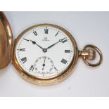 An Omega 9ct gold half hunter pocket watch, signed enamel dial with Roman numerals and seconds