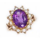 An amethyst and split pearl cluster ring, the oval cluster measuring approx. 17mm x 15mm, hallmarked