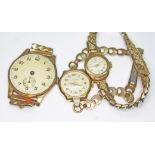 Three 9ct gold wristwatches comprising a gent's and two ladies with gold plated straps.