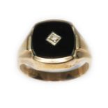 A hallmarked 9ct gold diamond and black onyx signet ring, gross wt. 5g, size Q.