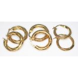 Three pairs of 9ct gold hoop earrings, various marks, gross wt. 7g.