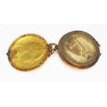 A bloodstone locket pendant fob, formed from a George III 1791 guinea, hinged and opening to