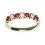 A diamond and ruby ring, hallmarked 9ct gold, sponsor 'ST', Sheffield 1993, gross wt. 2g, size O/P.
