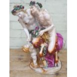 A large Meissen style "Bacchus" porcelain figure group, late 19th century, modelled as a faun,