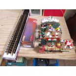 G Scale model railway comprising two boxes of Piko track and a New Bright Father Christmas train.