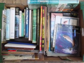 A box of mainly fly fishing books and catalogues including Hardy, circa 1970s.