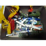 A box of assorted die-cast model vehicles, mainly army.