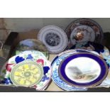 A box of assorted plates and dishes including the top of a tazza hand painted with cattle and signed