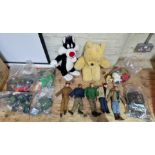 A box of Action Man figures and accessories, together with two soft toys.