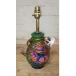 A Moorcroft pottery lamp base, height (including fitting) 32cm.