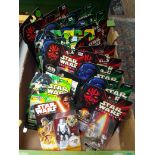 A box of assorted mainly boxed and unopened Star Wars toys.