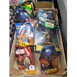 A box of assorted mainly boxed and unopened Star Wars toys.