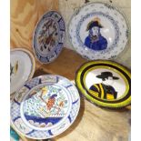 A collection of French Quimper pottery including a dish entitled 'Joubert', a pair of portrait