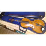 A 20th century student violin with bow and hard case.