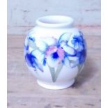 A Moorcroft Orchid vase, height 16cm. Condition - good, no damage/repair.