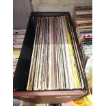 A case of LP records and 12" singles including Beatles, Who, Status Quo, Rolling Stones etc.