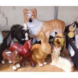 A group of seven assorted animal figures.