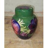 A Moorcroft pottery ginger jar and cover, height 15.5cm. Condition - slight chip to cover, otherwise