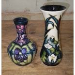 Two Moorcroft pottery vases, height 10cm & 13cm. Condition - good, no damage/repair.