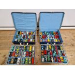 Two matchbox cases and vehicles