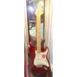 A Fender USA 2013 Stratocaster, slimline body, Candy apple red, serial no. US13009174.
