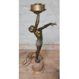 An Art Deco gilt spelter lamp modelled as a semi nude female figure on alabaster base, height 55cm.