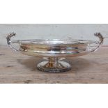 A George V twin handle silver pedestal bowl, Barker Brothers, Chester 1922, length 31cm, wt.