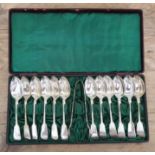 A cased set of twelve Edward VII silver teaspoons and sugar tongs, James Deakin & Sons (John &