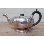 A George III silver teapot of pumpkin form, Joseph Angell I, London 1784, length 27cm, gross wt.