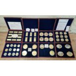 A group of eight assorted gold plated proof coin & banknote sets to include Banknotes of Great