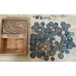 A wooden box containing assorted 19th century and earlier coins.