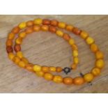 A single strand of butterscotch amber beads, gross wt. 15g.