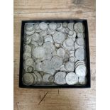 A tray of assorted gb silver coins to include half crowns, threepences, sixpences, shillings, two
