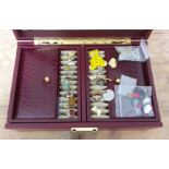 A jewellery box and contents including items marked 'gold on silver', etc.