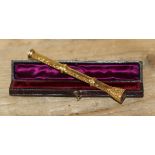 A 19th century gold plated double action propelling pencil and pen, engraved and set with a
