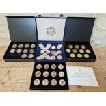 A group of assorted gold plated proof coins & sets to include the life and times of Queen