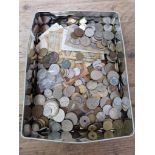 A box of world coins and banknotes