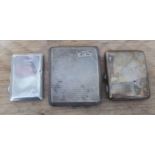 A group of three hallmarked silver cigarette cases, gross wt. 8.8ozt.