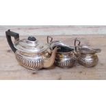 A three pieces hallmarked silver tea service, gross wt. 18ozt.