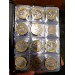 2 folders of assorted collectable GB coins to include £2, £1, & 50p etc.