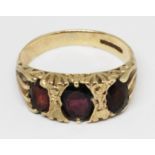 A hallmarked 9ct gold garnet and paste ring, gross wt. 2.9g, size K.