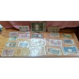 A collection of assorted world banknotes