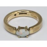 A 9ct gold opal ring, gross wt. 6.6g, size I.