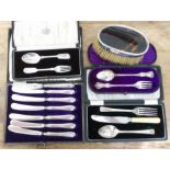 Various cased hallmarked silver cutlery sets and a tortoiseshell and silver backed brush, various