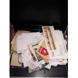 A briefcase containing first day covers