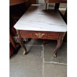 A continental marble top and gilt mounted coffee table.